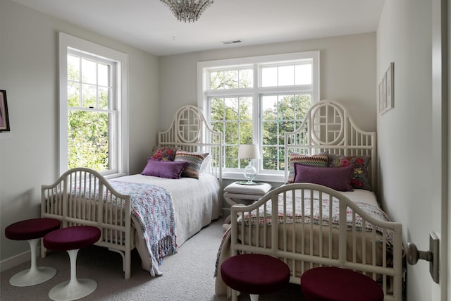 1824 Oliver Ave S, Minneapolis, MN 55405 - bedroom with multiple windows and carpet flooring