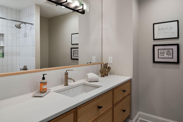 1824 Oliver Ave S, Minneapolis, MN 55405 - bathroom featuring vanity and a tile shower