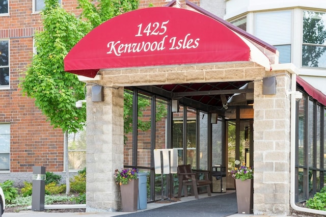 1425 28th St Unit 519, Minneapolis, MN 55408 - view of exterior entry with brick siding