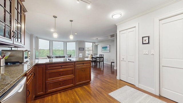 1425 28th St Unit 519, Minneapolis, MN 55408 - kitchen featuring dishwasher, dark wood-style flooring, a peninsula, glass insert cabinets, and ornamental molding