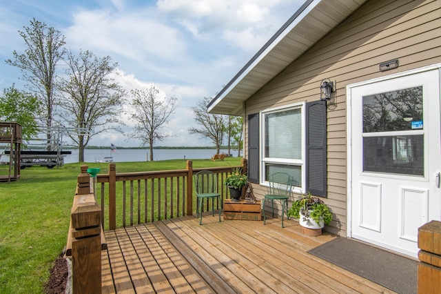 692 Round Lake Ln, Georgetown Twp, WI 54853 - wooden terrace with a water view and a lawn