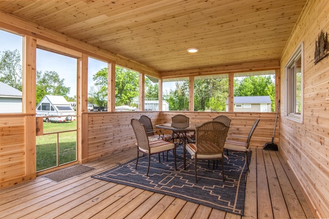 692 Round Lake Ln, Georgetown Twp, WI 54853 - sunroom / solarium featuring a wooden deck, outdoor dining space, hardwood / wood-style floors, and wooden ceiling