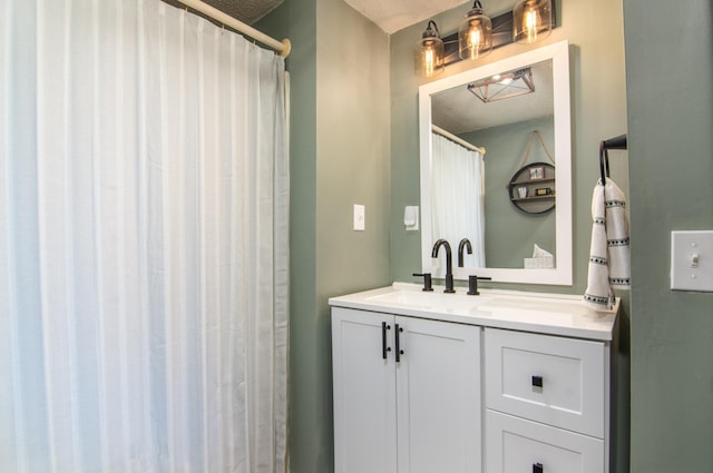 692 Round Lake Ln, Georgetown Twp, WI 54853 - full bath featuring a textured ceiling and vanity