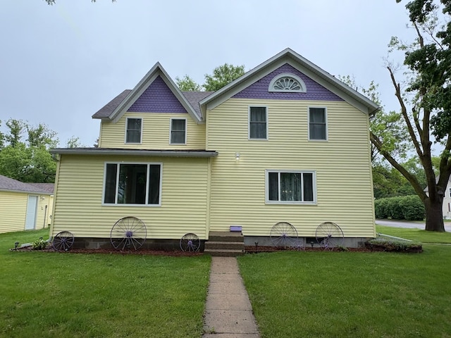 809 14th St S, Benson, MN 56215 - rear view of house with a lawn
