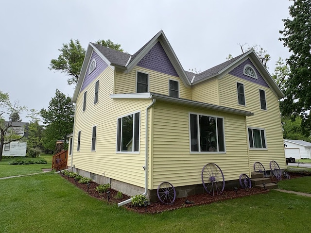 809 14th St S, Benson, MN 56215 - view of side of property with a yard