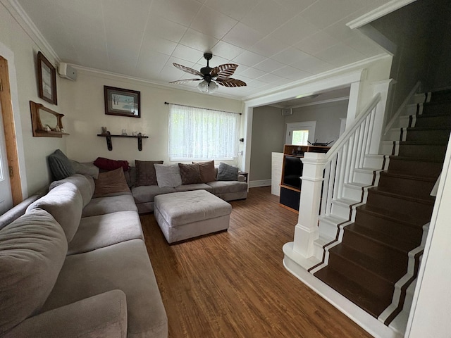 809 14th St S, Benson, MN 56215 - living room with ornamental molding, wood finished floors, ceiling fan, and stairway