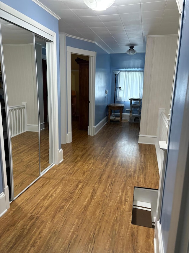 809 14th St S, Benson, MN 56215 - hall featuring wood finished floors, ornamental molding, and baseboards