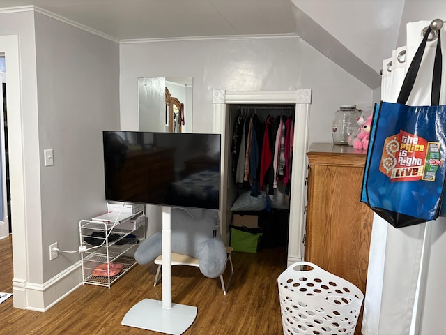 809 14th St S, Benson, MN 56215 - bedroom featuring wood finished floors, crown molding, a closet, and baseboards