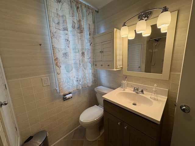 809 14th St S, Benson, MN 56215 - full bath featuring tile walls, toilet, curtained shower, vanity, and tile patterned floors