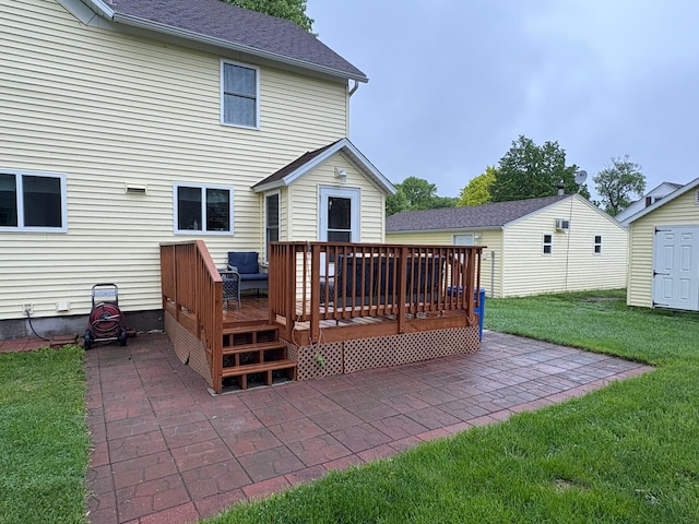 809 14th St S, Benson, MN 56215 - back of house with a yard, a patio, a deck, and roof with shingles