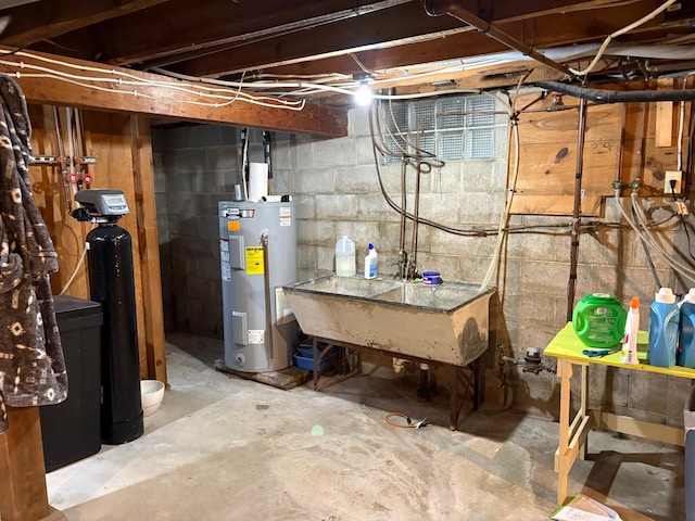 809 14th St S, Benson, MN 56215 - unfinished below grade area with electric water heater, a water softener, and a sink