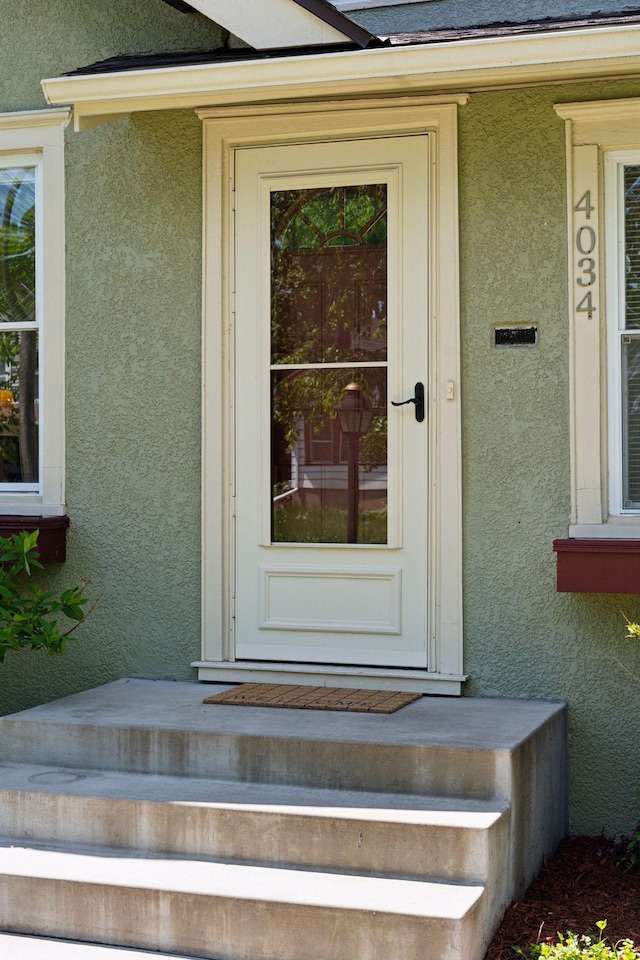 4034 Nokomis Ave, Minneapolis, MN 55406 - doorway to property with stucco siding