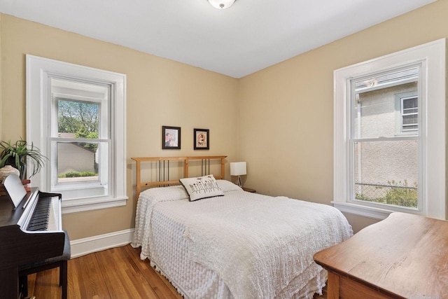 4034 Nokomis Ave, Minneapolis, MN 55406 - bedroom featuring baseboards and wood finished floors