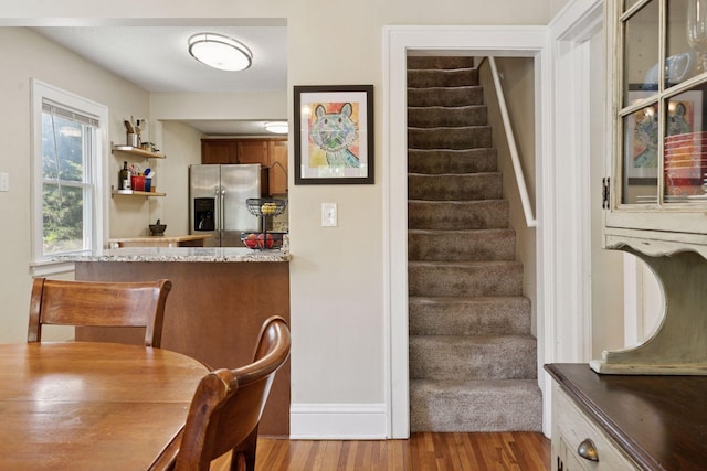 4034 Nokomis Ave, Minneapolis, MN 55406 - dining room with wood finished floors, stairs, and bar area