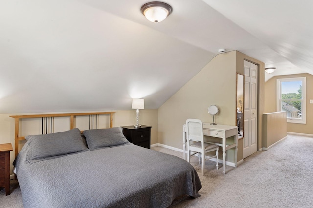 4034 Nokomis Ave, Minneapolis, MN 55406 - carpeted bedroom featuring lofted ceiling and baseboards
