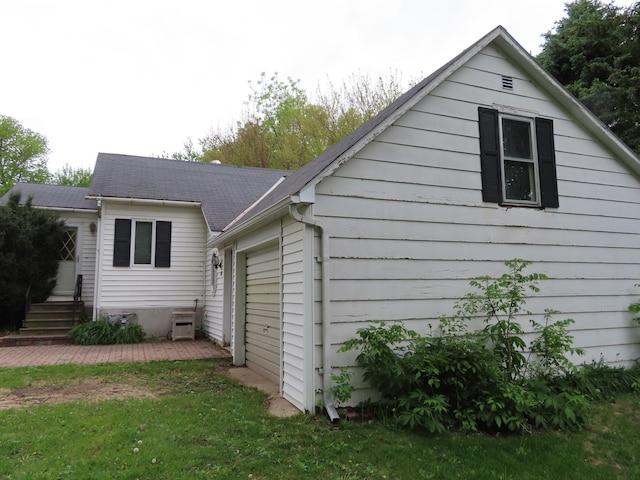 114 2nd St S, Truman, MN 56088 - view of property exterior with roof with shingles