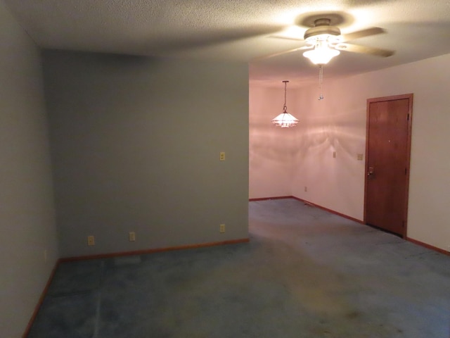 114 2nd St S, Truman, MN 56088 - unfurnished room with a ceiling fan, carpet floors, baseboards, and a textured ceiling