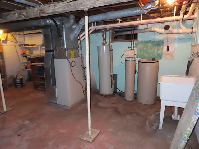 114 2nd St S, Truman, MN 56088 - unfinished below grade area featuring gas water heater, a water softener, heating unit, and a sink