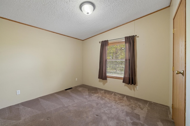 58885 County Road 136, Menahga, MN 56464 - unfurnished room featuring crown molding, carpet flooring, vaulted ceiling, and a textured ceiling