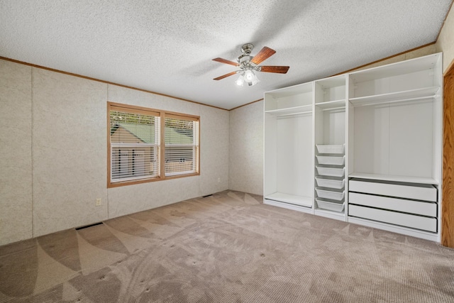 58885 County Road 136, Menahga, MN 56464 - unfurnished bedroom with carpet floors, a textured ceiling, ceiling fan, ornamental molding, and a closet