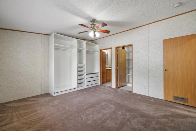 58885 County Road 136, Menahga, MN 56464 - unfurnished bedroom featuring ornamental molding, carpet floors, a textured ceiling, a ceiling fan, and connected bathroom
