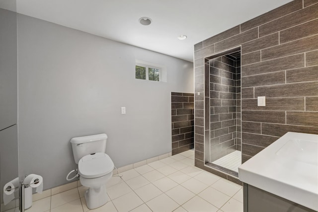 58885 County Road 136, Menahga, MN 56464 - full bath featuring toilet, tiled shower, vanity, and tile patterned floors