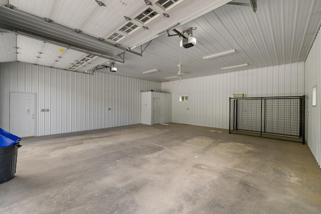 58885 County Road 136, Menahga, MN 56464 - garage featuring a garage door opener