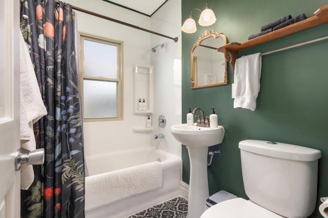 1750 Sims Ave, Saint Paul, MN 55106 - bathroom featuring shower / bath combo with shower curtain and toilet