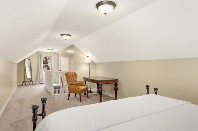 1750 Sims Ave, Saint Paul, MN 55106 - carpeted bedroom with baseboards, vaulted ceiling, and a textured ceiling