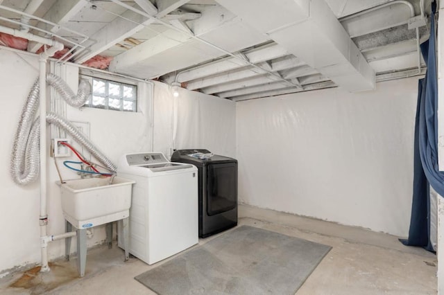 1750 Sims Ave, Saint Paul, MN 55106 - laundry area with washer and clothes dryer