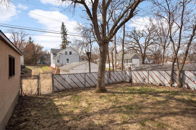 1750 Sims Ave, Saint Paul, MN 55106 - fenced backyard with a gate and a residential view