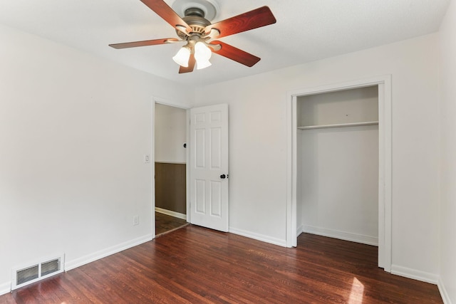 218 Owens St N, Stillwater, MN 55082 - unfurnished bedroom with wood finished floors, a closet, baseboards, and a ceiling fan
