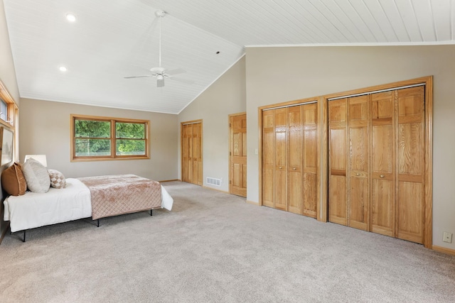218 Owens St N, Stillwater, MN 55082 - carpeted bedroom featuring lofted ceiling, multiple closets, baseboards, a ceiling fan, and recessed lighting