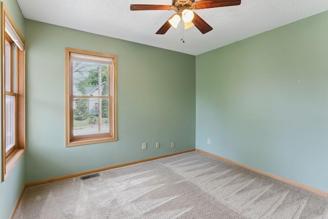218 Owens St N, Stillwater, MN 55082 - empty room with carpet, ceiling fan, baseboards, and a textured ceiling