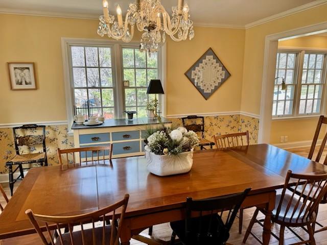 331 Willamor Cir, Albert Lea, MN 56007 - dining room with a chandelier and ornamental molding