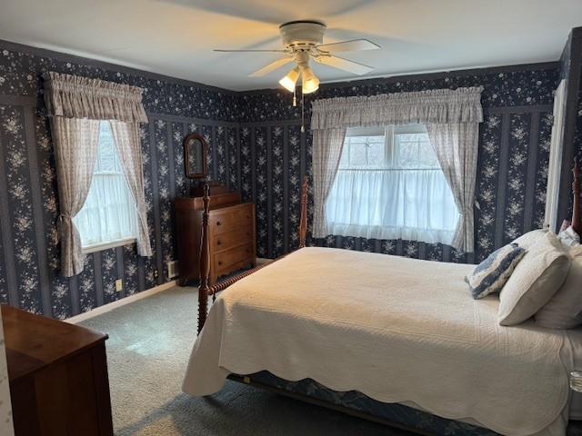 331 Willamor Cir, Albert Lea, MN 56007 - carpeted bedroom with wallpapered walls and a ceiling fan