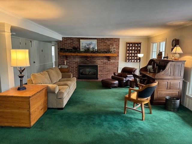 331 Willamor Cir, Albert Lea, MN 56007 - carpeted living room with a fireplace and crown molding