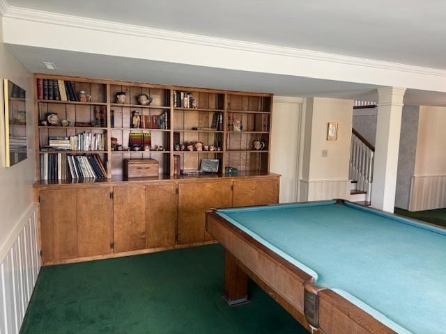 331 Willamor Cir, Albert Lea, MN 56007 - playroom with a wainscoted wall, dark carpet, a decorative wall, crown molding, and decorative columns