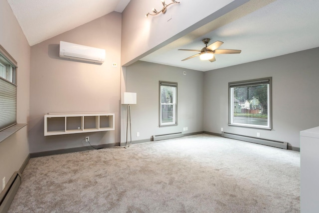 428 4th St, River Falls, WI 54022 - unfurnished living room with a baseboard radiator, a wall unit AC, plenty of natural light, and vaulted ceiling
