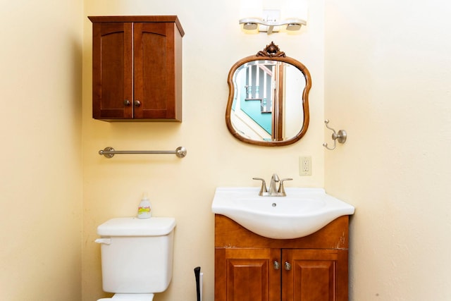 428 4th St, River Falls, WI 54022 - half bathroom featuring vanity and toilet