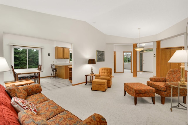 842 Monet Ct, Mendota Heights, MN 55120 - living area featuring vaulted ceiling, baseboards, and light colored carpet