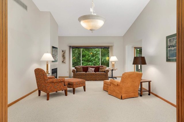 842 Monet Ct, Mendota Heights, MN 55120 - carpeted living area featuring baseboards and vaulted ceiling