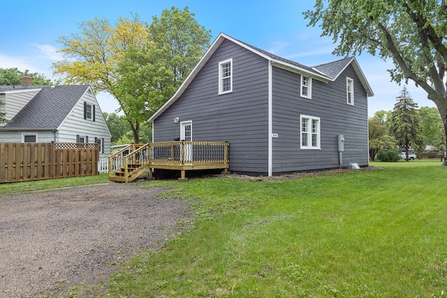 806 4th St, Marshall, MN 56258 - view of side of home featuring a wooden deck
