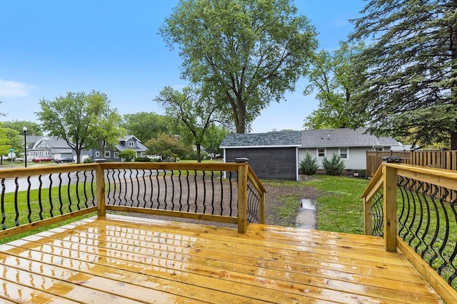 806 4th St, Marshall, MN 56258 - wooden terrace featuring a lawn