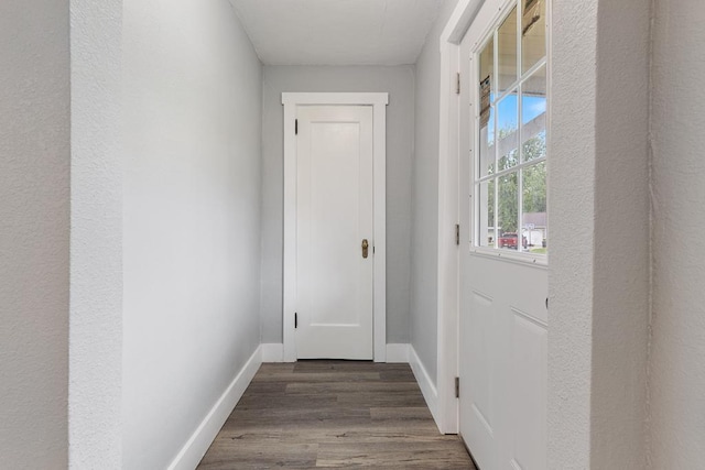 806 4th St, Marshall, MN 56258 - doorway to outside featuring wood finished floors and baseboards