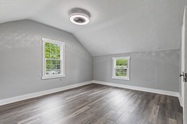 806 4th St, Marshall, MN 56258 - bonus room featuring plenty of natural light, wood finished floors, lofted ceiling, and baseboards