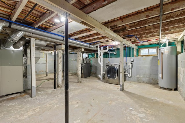 806 4th St, Marshall, MN 56258 - basement featuring gas water heater, separate washer and dryer, and heating unit