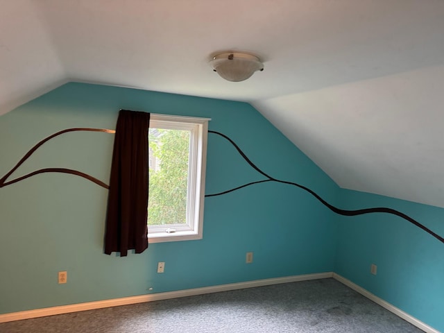 605 Division St W, Faribault, MN 55021 - additional living space featuring lofted ceiling, carpet flooring, and baseboards