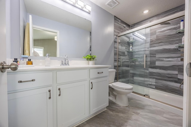 4329 141st Ln NW, Andover, MN 55304 - full bathroom featuring a shower stall, toilet, vanity, marble finish flooring, and a textured ceiling