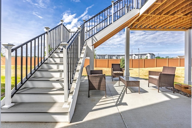4329 141st Ln NW, Andover, MN 55304 - view of patio / terrace featuring stairs and an outdoor living space